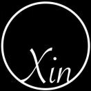 XIN****